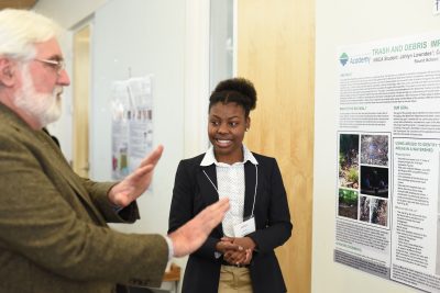 student showcasing research