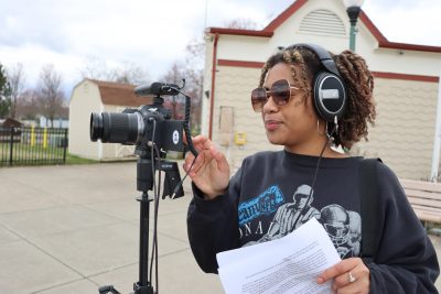 student using a camera